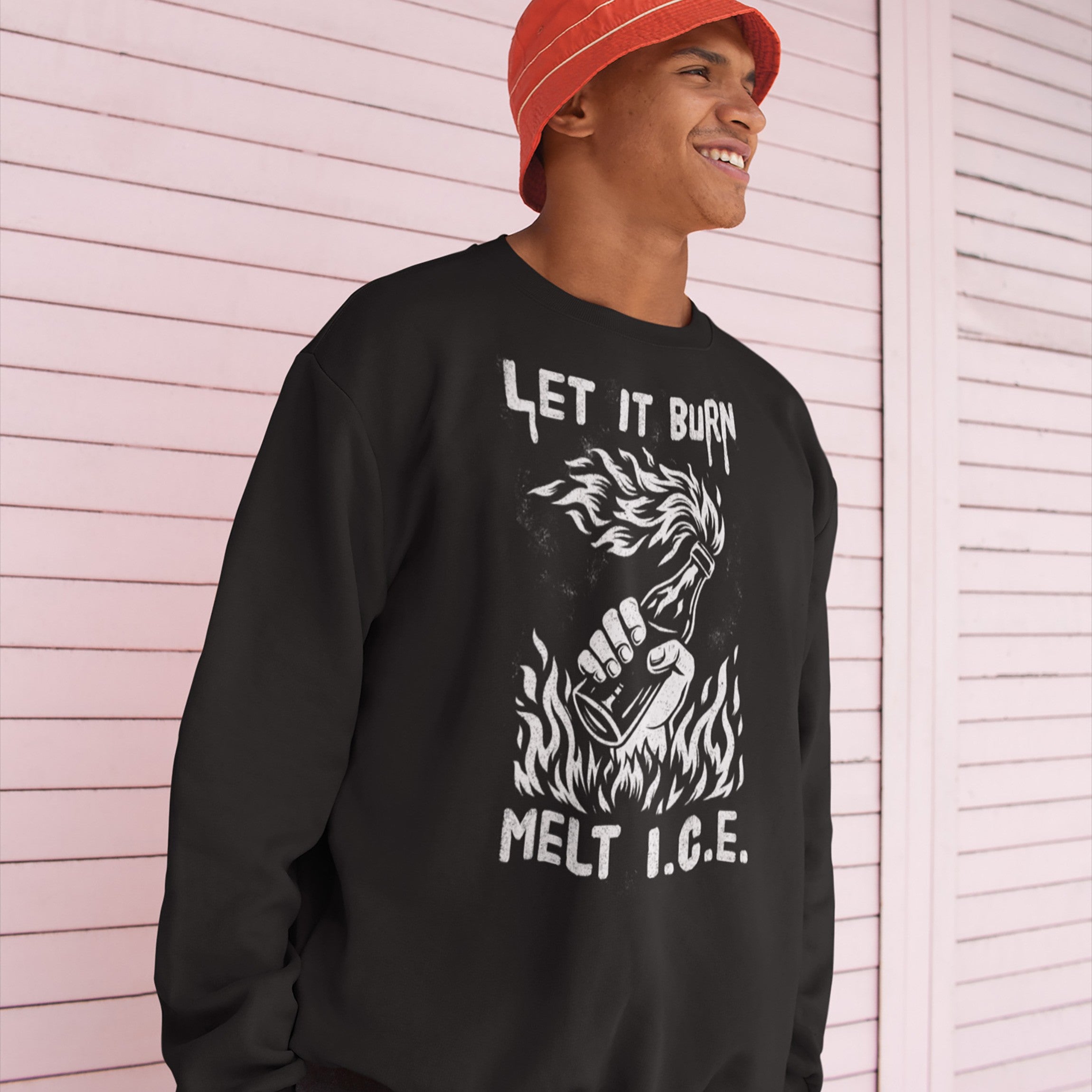 Young man wears Let It Burn / Melt ICE Hoodie & Sweatshirt featuring a Molotov cocktail graphic and protest slogans, embodying a bold statement against cruelty and supporting equality.