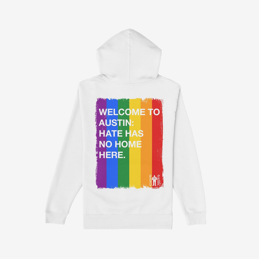 The Custom Hate Has No Home Here Pride Hoodie features a vibrant rainbow stripe and bold message on the back, embodying support for equality and LGBTQ+ pride.