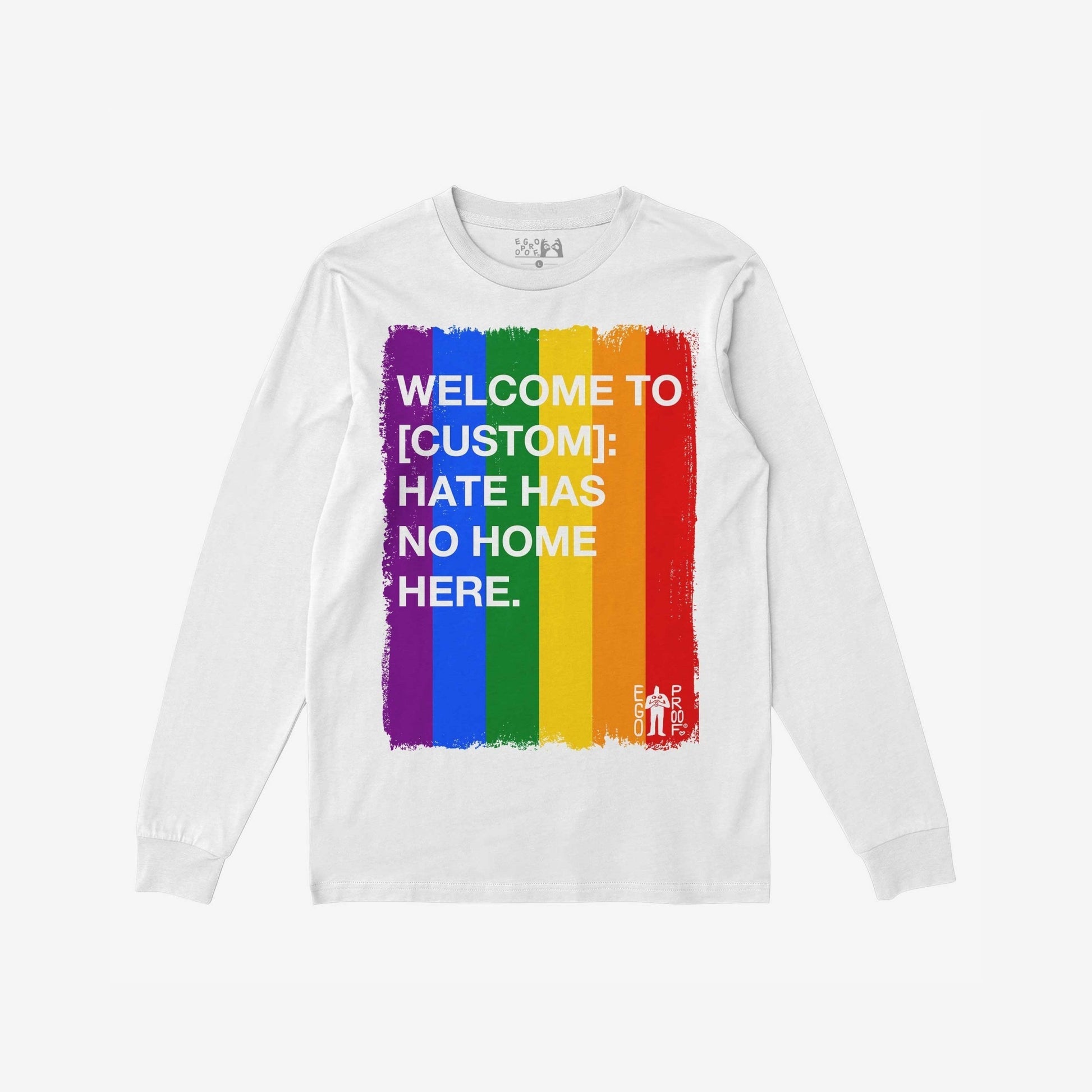 Custom Hate Has No Home Here Pride Long Sleeve T-shirt featuring a vertical brush-stroke rainbow graphic with a bold anti-hate message and small EGO PROF logo, perfect for personalization and activism.