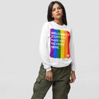 Person in olive cargo pants and a white sweatshirt featuring a rainbow block and WELCOME TO [CUSTOM]: HATE HAS NO HOME HERE text, showcasing the Custom Hate Has No Home Here Pride Long Sleeve T-shirt.