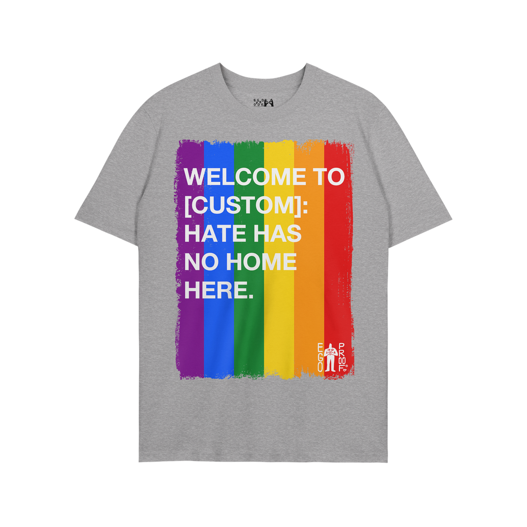 Custom Hate Has No Home Here Pride T-shirt featuring a vertical rainbow-stripe graphic with a bold, inclusive message promoti