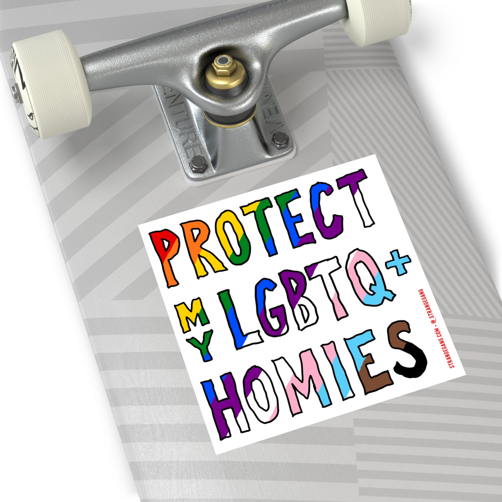 The underside of a skateboard displays the Protect My LGBTQ+ Homies sticker, showcasing vibrant, pride-themed colors and a hand-drawn design, embodying equality and allyship.