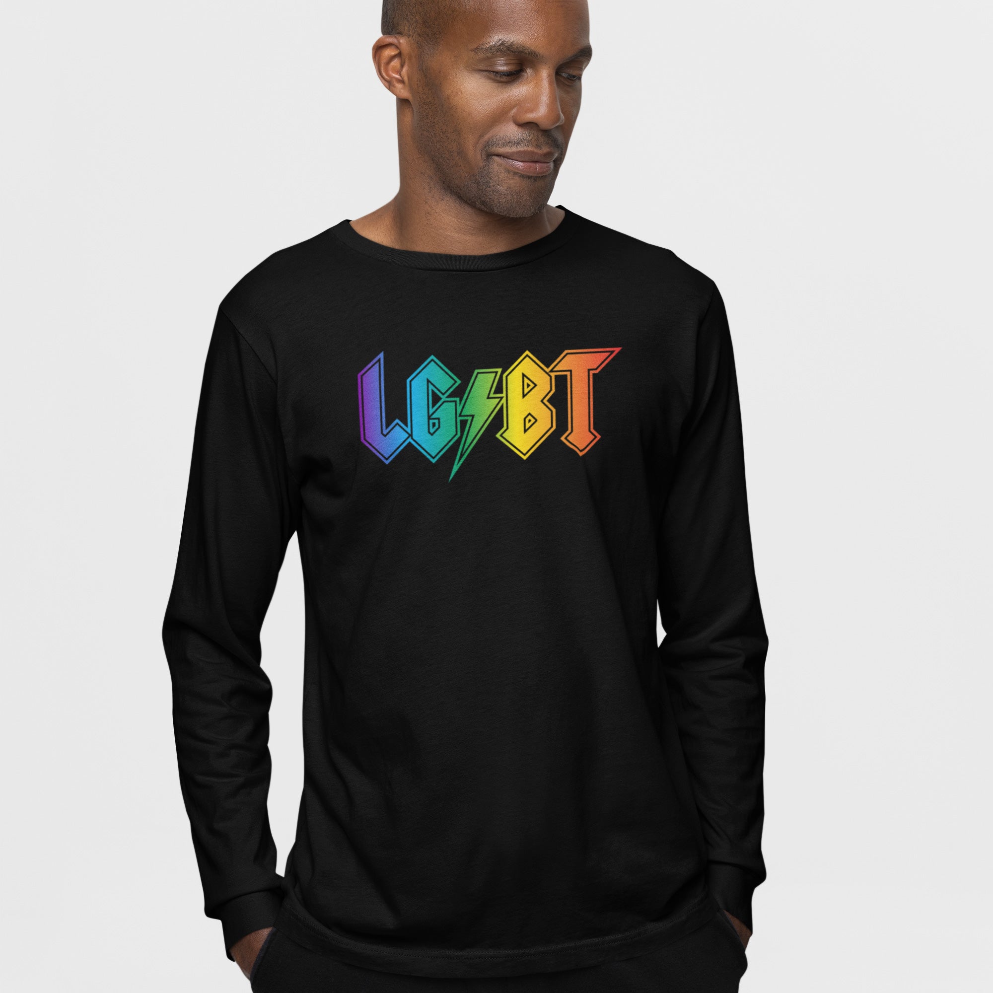 LGBTQ Rocks Shirt featuring a male model wearing a black long-sleeve tee with LGBT in bold, angular, rainbow-gradient font and a lightning-bolt design, celebrating LGBTQ+ pride and community.