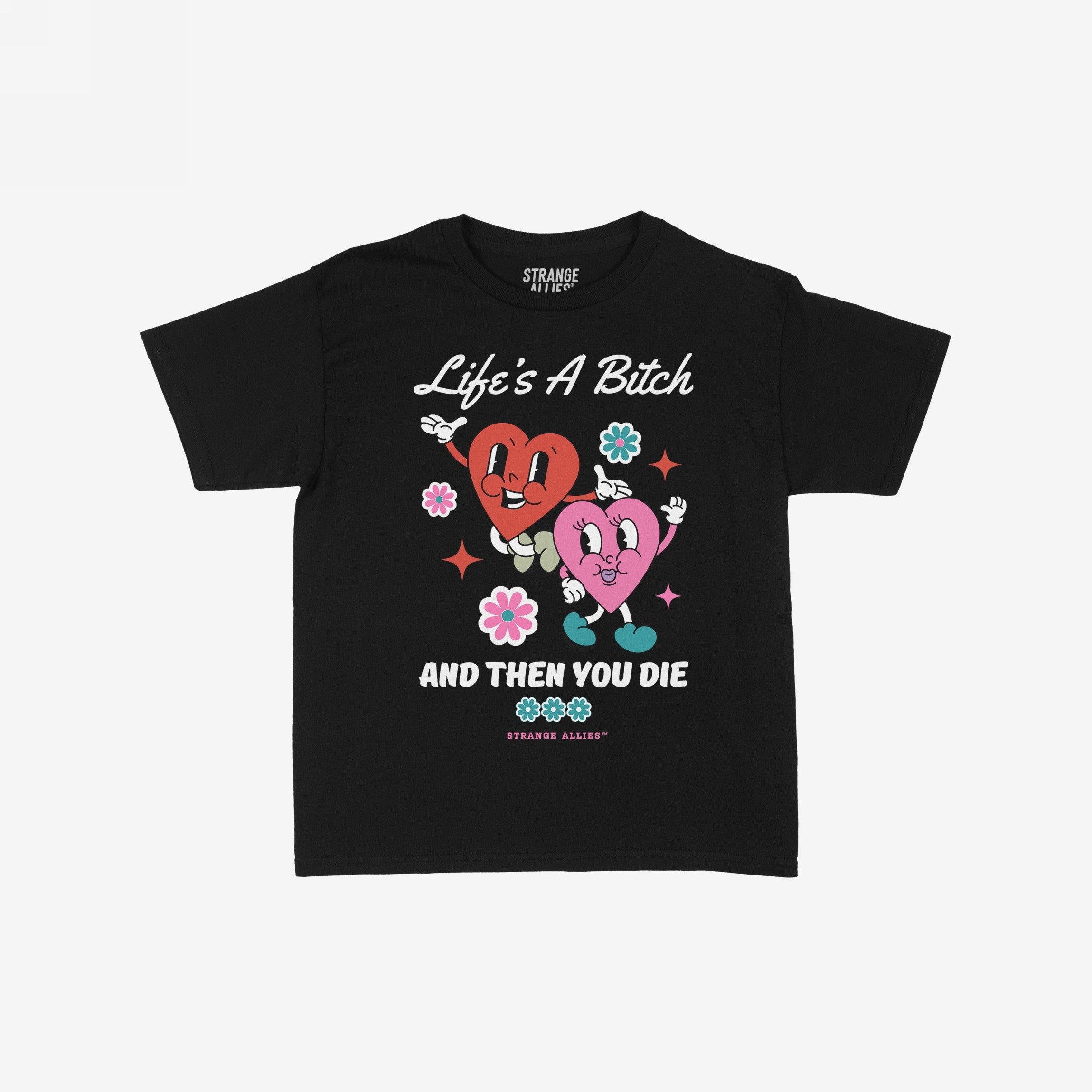 Life's A Bitch Women's Baby Tee features cartoon hearts dancing among flowers, paired with the phrase Life's A Bitch, And Then You Die, blending cute visuals with a candid message.