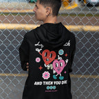 Person wearing a Life's A Bitch Shirt hoodie with retro cartoon hearts, flowers, and sparkles, expressing a straightforward message about life's challenges. Perfect for those embracing honesty and comfort.