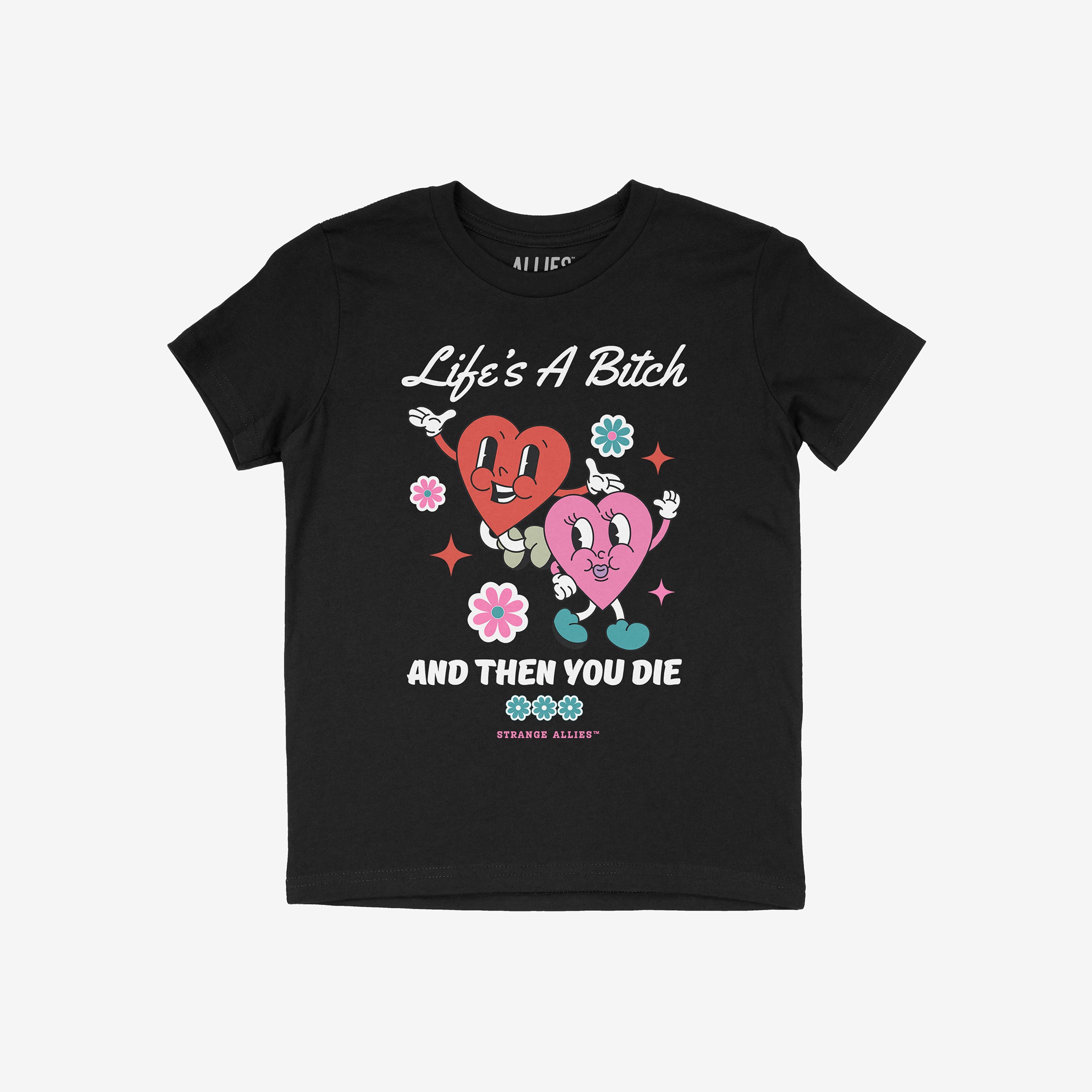 Life's A Bitch Shirt featuring retro-cartoon design with two smiling hearts, flowers, and sparkles, boldly stating 'Life’s A Bitch And Then You Die' in playful script and block letters.