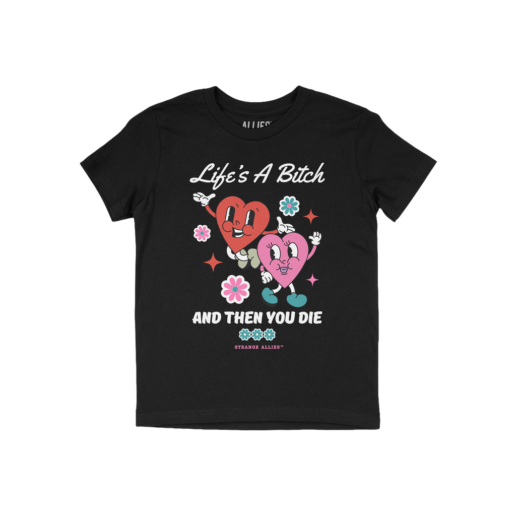 Life's A Bitch Shirt featuring retro-cartoon design with two smiling hearts, flowers, and sparkles, boldly stating 'Life’s 