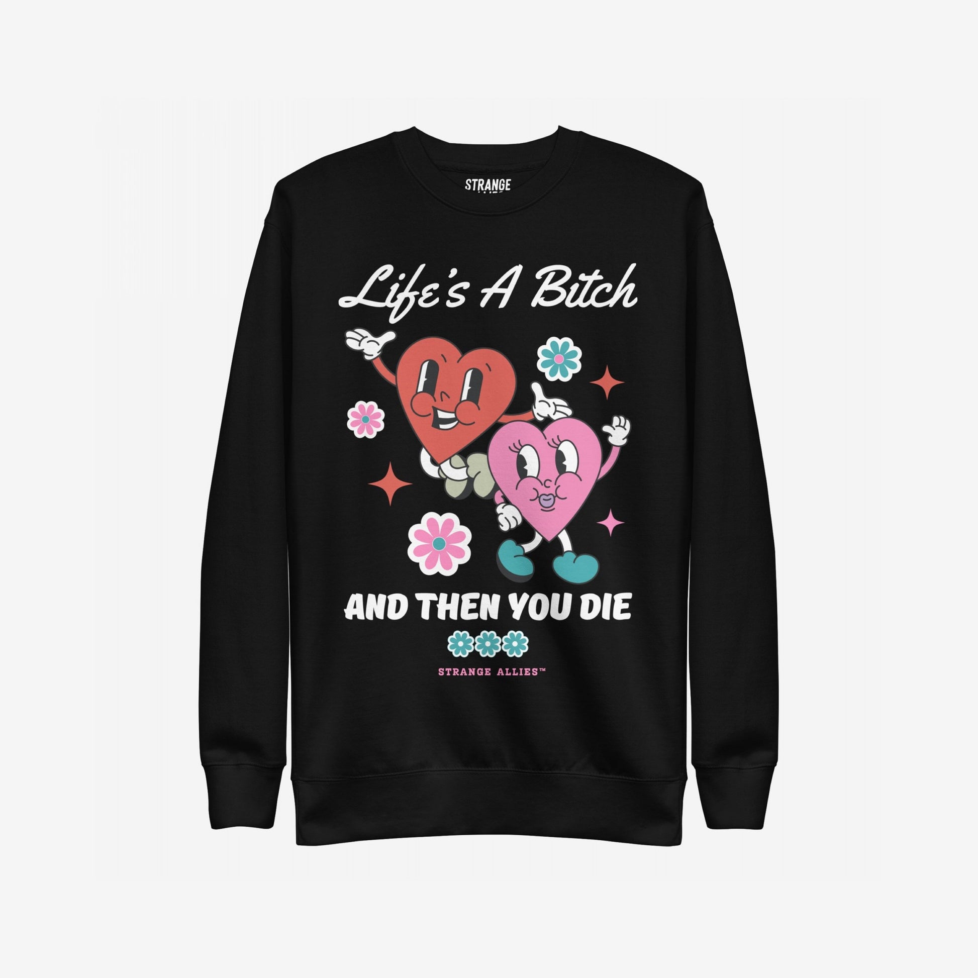Life's A Bitch Hoodie & Sweatshirt features dancing hearts and bold text, humorously embracing life's absurdity. Ideal for realists seeking comfort and honesty with a playful, dark twist.