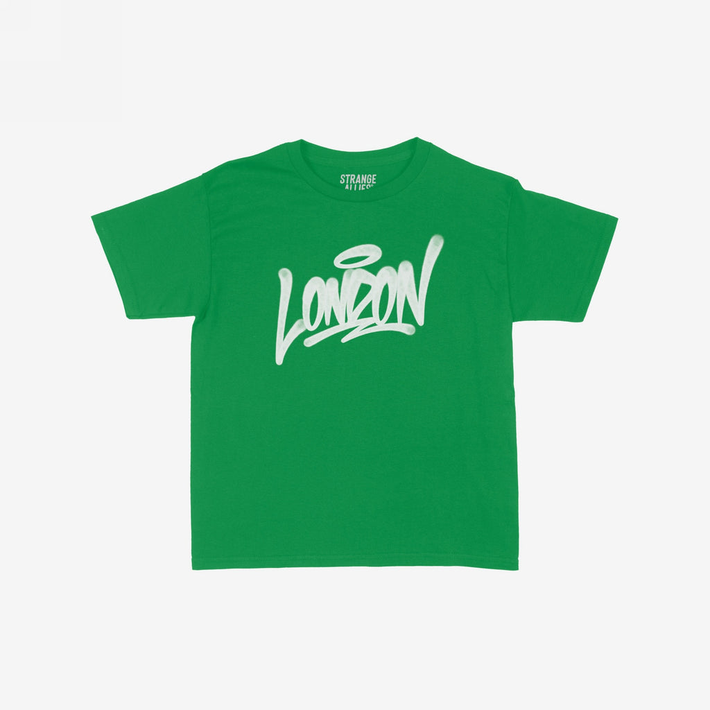 Bright green London Handstyle Women's Baby Tee features bold white graffiti-style script with a halo, embodying the store's commitment to equality and support for all communities. Brand name “STRANGE ALLIES” visible inside collar.