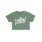 Bright green London Handstyle Women's Baby Tee features bold white graffiti-style script with a halo, embodying the store's c