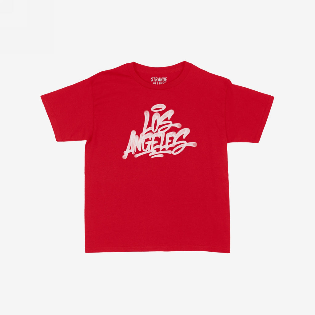 Los Angeles Handstyle Women's Baby Tee features a bold white graffiti-style Los Angeles graphic across the chest with a halo, embodying a retro Y2K vibe. Small STRANGE ALLIES text appears at the back.