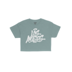 Royal-blue crew-neck T-shirt, Los Angeles in white graffiti script on front. Inside neck label reads “STRANGE ALLIES.” Th