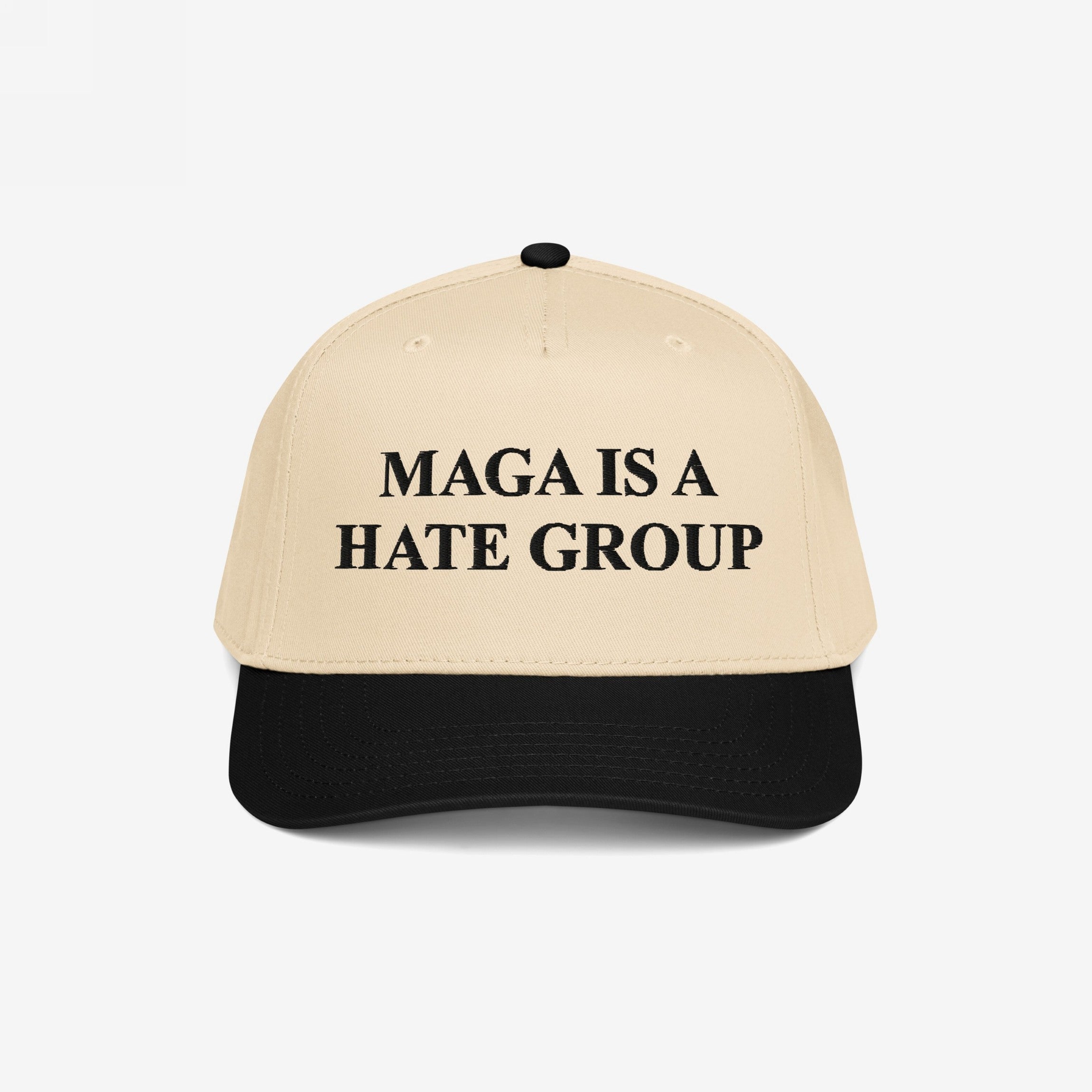 Two-tone baseball cap with MAGA Is A Hate Group embroidered, reflecting progressive, anti-fascist values. Ideal for protests or daily wear, supporting equality and immigrant rights.