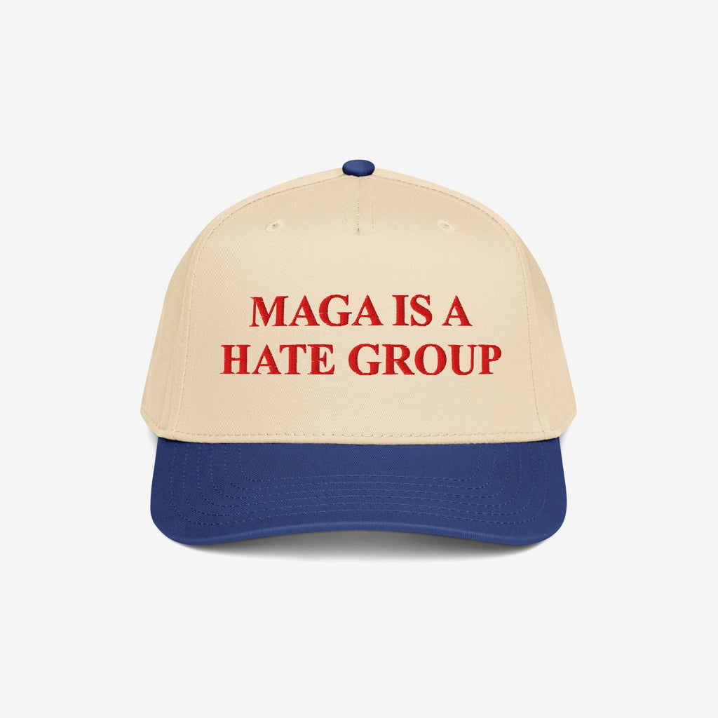 MAGA Is A Hate Group Hat features a beige crown with a blue brim, embroidered boldly in red. Perfect for progressives and equality supporters, this hat embodies a strong, anti-fascist message.