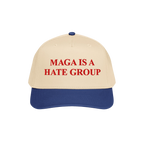 MAGA Is A Hate Group Hat features a beige crown with a blue brim, embroidered boldly in red. Perfect for progressives and equ