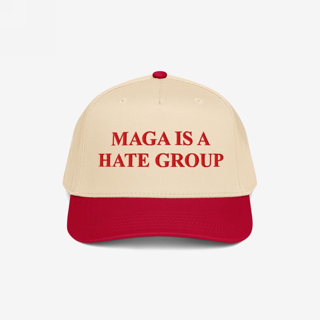 Two-tone MAGA Is A Hate Group hat with a red brim and light tan crown, featuring bold red embroidery, catering to progressive and equality-driven individuals challenging hate in politics.