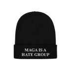 Black rib-knit beanie with folded cuff, embroidered with MAGA IS A HATE GROUP in white. Ideal for progressives and equality s