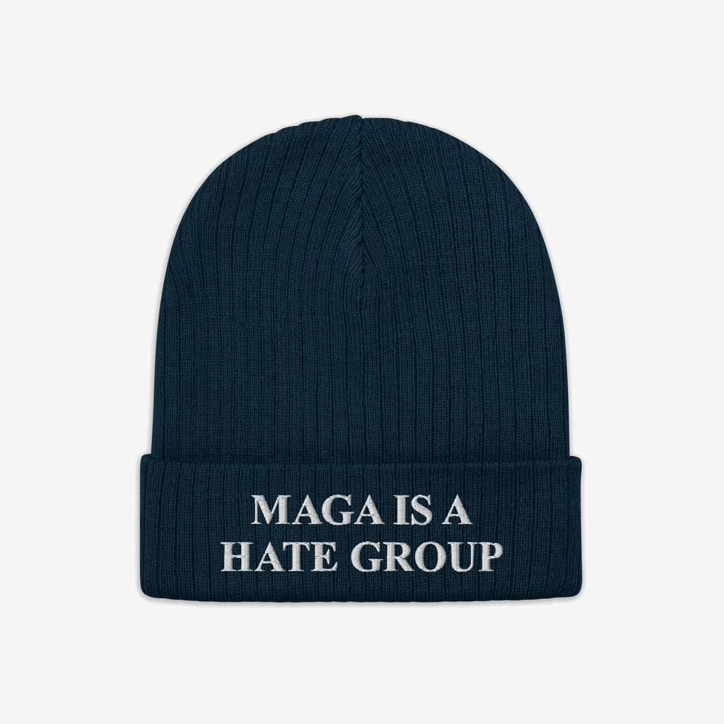 Navy-blue knit beanie with folded cuff, embroidered with MAGA Is A Hate Group in white, symbolizing progressive resistance and equality support.