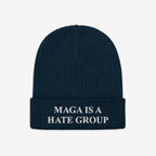 Navy-blue knit beanie with folded cuff, embroidered with MAGA Is A Hate Group in white, symbolizing progressive resistance and equality support.