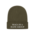Olive-green rib-knit beanie with a folded cuff, featuring MAGA IS A HATE GROUP embroidered in white capitals. Ideal for progr