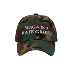 Camouflage-patterned baseball cap with MAGA IS A HATE GROUP in white embroidery, representing progressive activism and anti-f