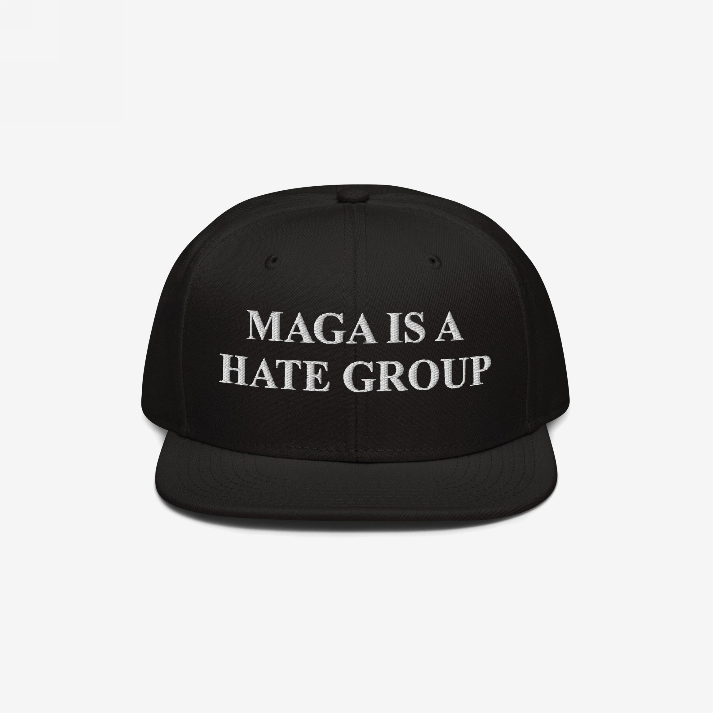 MAGA Is A Hate Group Hat: A black snapback with white embroidered text, embodying progressive and equality values. Ideal for protests and everyday wear, supporting anti-fascism and immigrant rights.