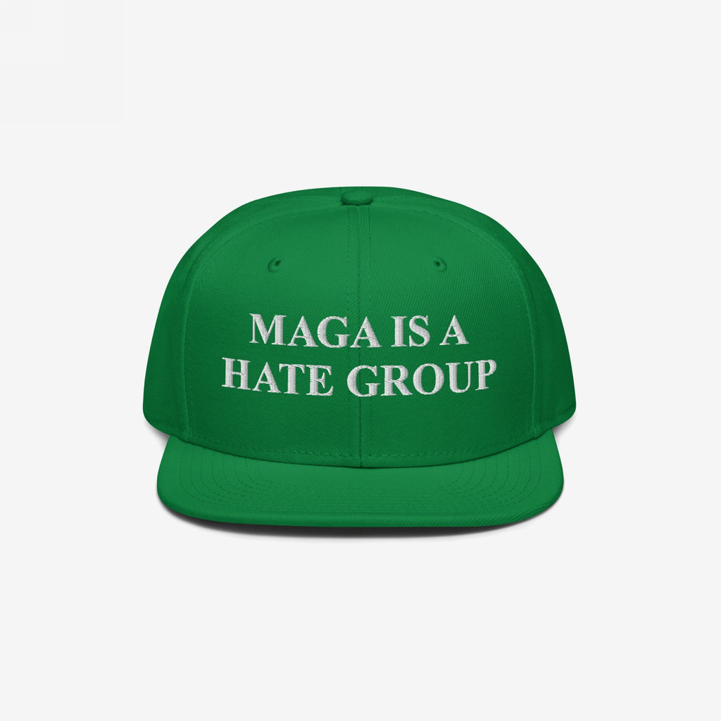 Green flat-brimmed cap with white embroidered text MAGA IS A HATE GROUP, embodying progressive values and anti-fascism. Ideal for protests and everyday wear, supporting equality and immigrant rights.