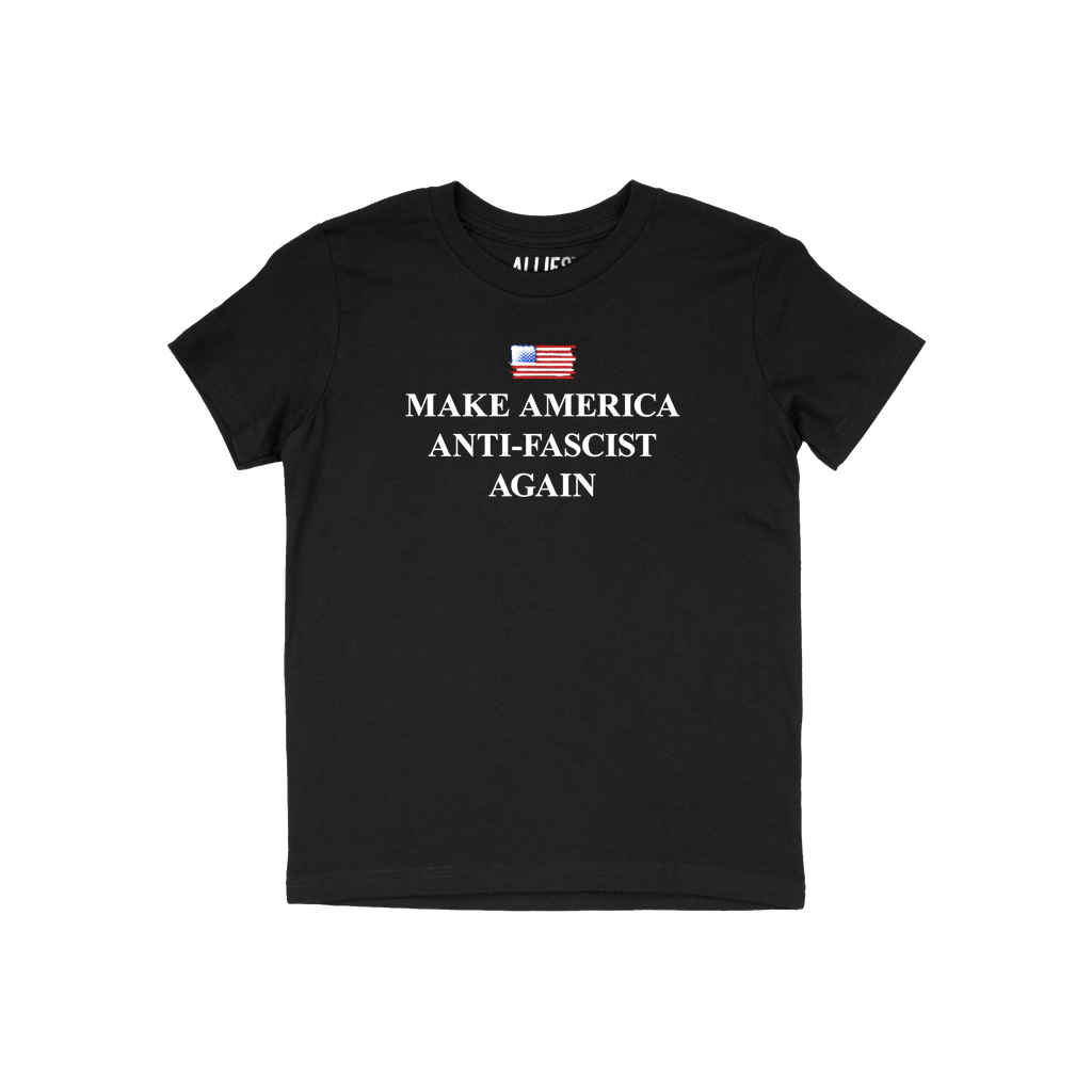 Black T-shirt featuring a distressed American flag and bold serif text: MAKE AMERICA ANTI-FASCIST AGAIN, expressing defiance 
