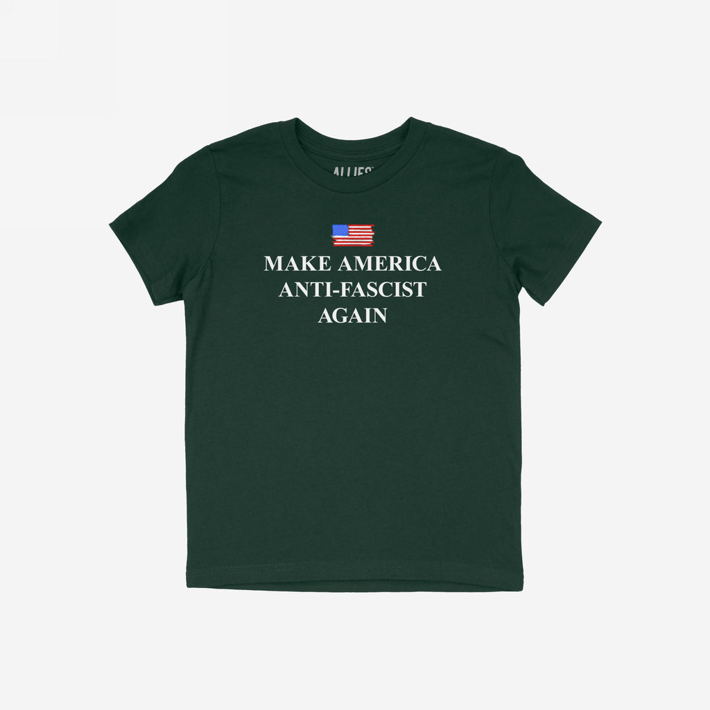 Make America Anti-Fascist Again T-shirt features a distressed American flag above bold lettering, conveying a strong anti-fascist message. Ideal for those advocating democracy and equality.