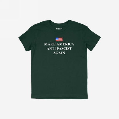 Make America Anti-Fascist Again T-shirt features a distressed American flag above bold lettering, conveying a strong anti-fascist message. Ideal for those advocating democracy and equality.