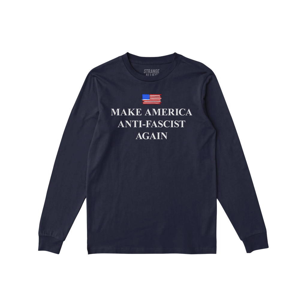 Navy-blue long-sleeve tee with a distressed U.S. flag graphic and MAKE AMERICA ANTI-FASCIST AGAIN in bold white lettering, em