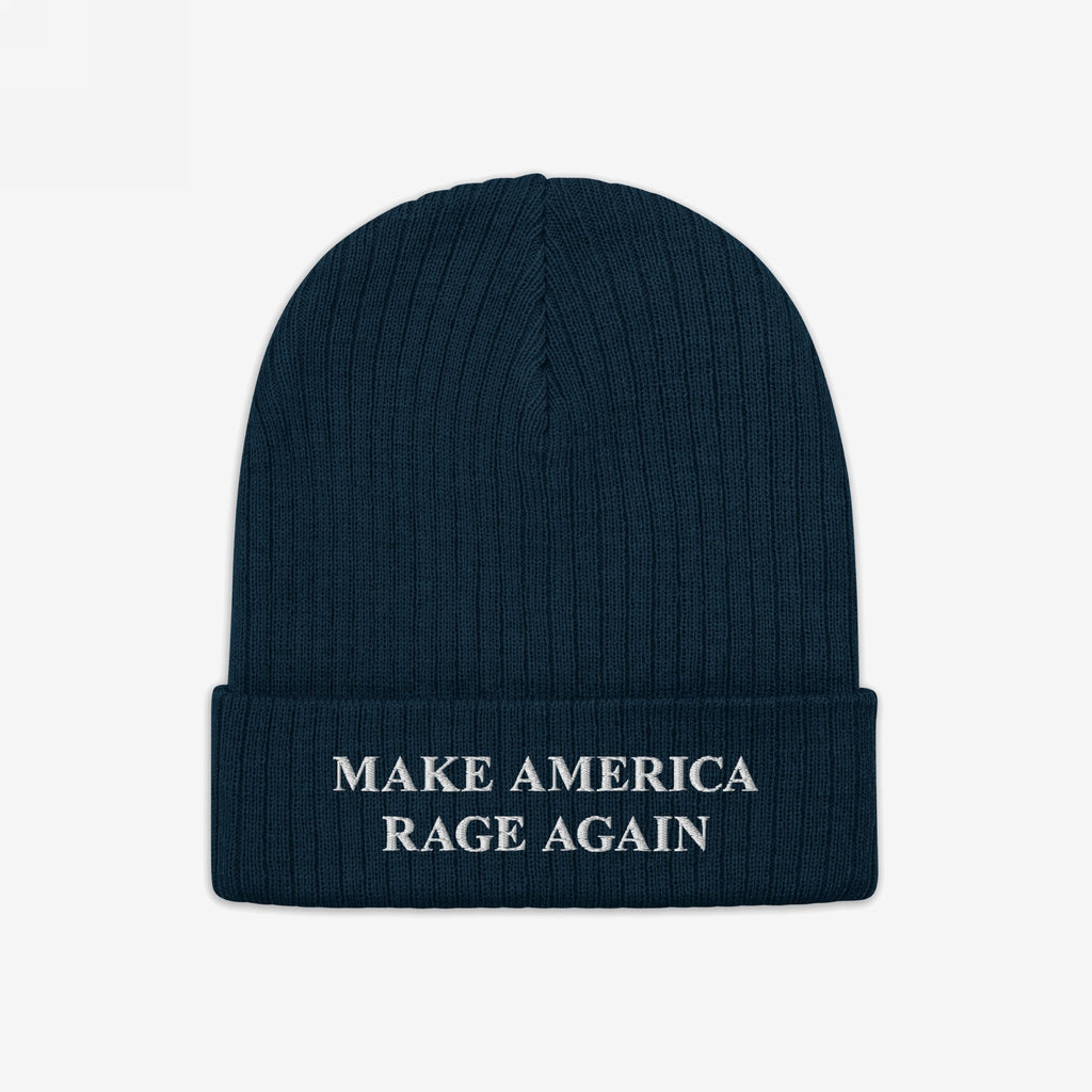 Dark navy rib-knit beanie hat with a folded cuff, featuring the embroidered phrase “MAKE AMERICA RAGE AGAIN” in white, embodying anti-fascist protest spirit from the Make America Rage Again Hat collection.