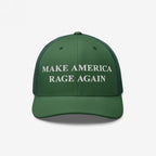 Make America Rage Again Hat: Green trucker-style cap with white embroidery reading “MAKE AMERICA RAGE AGAIN,” featuring a solid front and mesh back, embodying anti-fascist protest spirit and visible values.