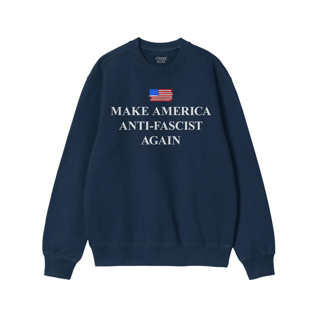 Navy-blue crewneck sweatshirt with Make America Anti-Fascist Again under a small American flag, embodying a bold stance again