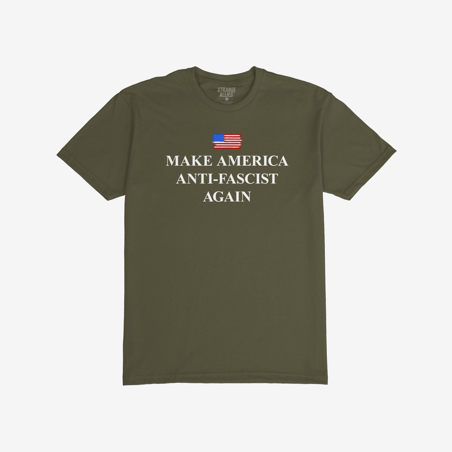 Make America Anti-Fascist Again T-shirt with a small U.S. flag and bold serif slogan, reflecting a stance against authoritarianism, showcasing the message above “STRANGE ALLIES” label inside the collar.