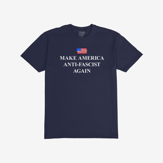 Navy-blue T-shirt featuring a distressed American flag and bold “MAKE AMERICA ANTI-FASCIST AGAIN” slogan, advocating against fascism and supporting equality.