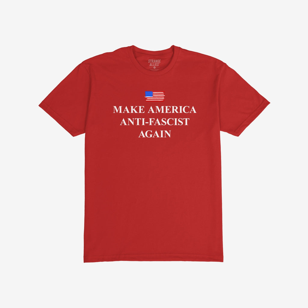 Red short-sleeve T-shirt featuring a stylized American flag and bold white text, MAKE AMERICA ANTI-FASCIST AGAIN, embodying a strong anti-fascist message by Strange Allies.