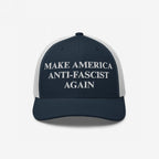 Make America Anti-Fascist Again Hat, featuring a navy front with light grey mesh, boldly embroidered with its slogan, encapsulates a stand against authoritarianism and bigotry.