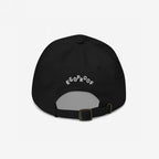 Back view of the Make Art Every Day Hat, featuring EGOPROOF embroidery above the adjustable strap and metal buckle, reflecting creativity and commitment for artists and designers.