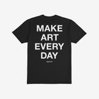 Black T-shirt titled Make Art Every Day, featuring large white text on the back and Eggproof branding. Unisex fit, suitable for creative, everyday wear. Available in various styles and sizes.