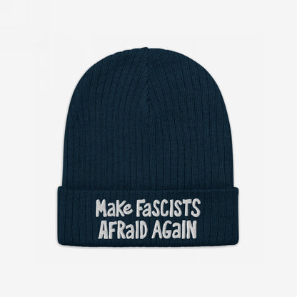 Dark navy-blue knitted beanie with “Make Fascists Afraid Again” embroidered in white on the cuff, conveying bold resistance.