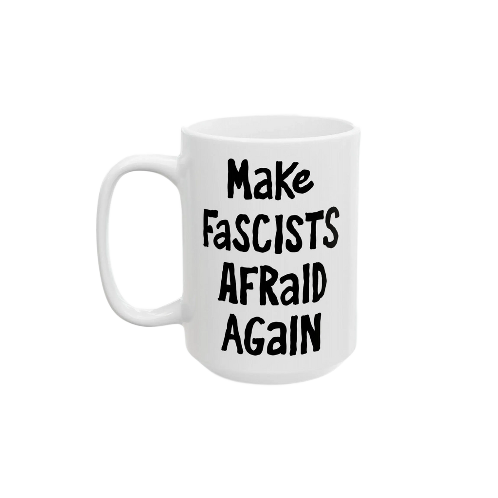 White ceramic mug with black, hand-drawn lettering: “Make Fascists Afraid Again”. Bold message supports resistance, ideal for activism-minded coffee lovers. Available in 11 oz and 15 oz sizes.