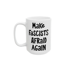 White ceramic mug with black, hand-drawn lettering: “Make Fascists Afraid Again”. Bold message supports resistance, ideal for activism-minded coffee lovers. Available in 11 oz and 15 oz sizes.