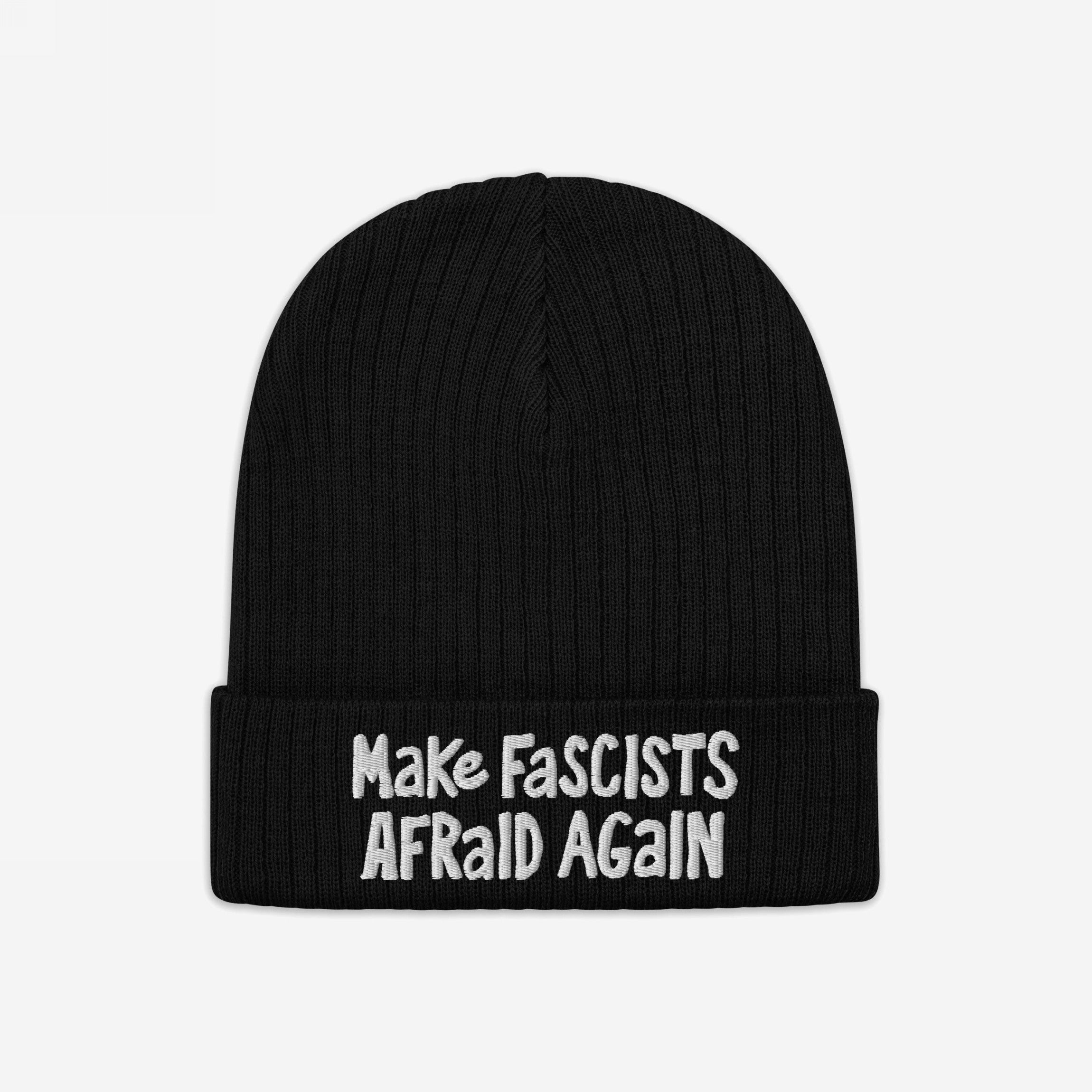 Black rib-knit beanie with Make Fascists Afraid Again in white embroidery, offering a bold, rebellious statement. Ideal for activists, features hand-drawn style for everyday resistance. Supports ACLU.