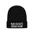 Black rib-knit beanie with Make Fascists Afraid Again in white embroidery, offering a bold, rebellious statement. Ideal for a