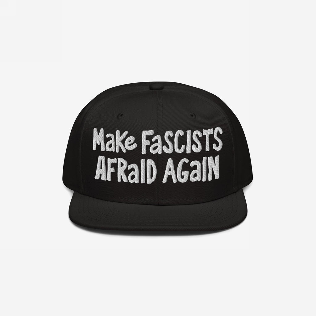 Make Fascists Afraid Again Hat featuring bold white embroidery on a black flat-bill snapback, embodying a rebellious statement against far-right ideologies, perfect for everyday activism and support of equality.