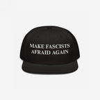 Black flat-brim cap featuring the bold slogan “MAKE FASCISTS AFRAID AGAIN” in white embroidery. The Make Fascists Afraid Again Classic Hat embodies a fearless anti-fascist statement, ideal for progressive activism.