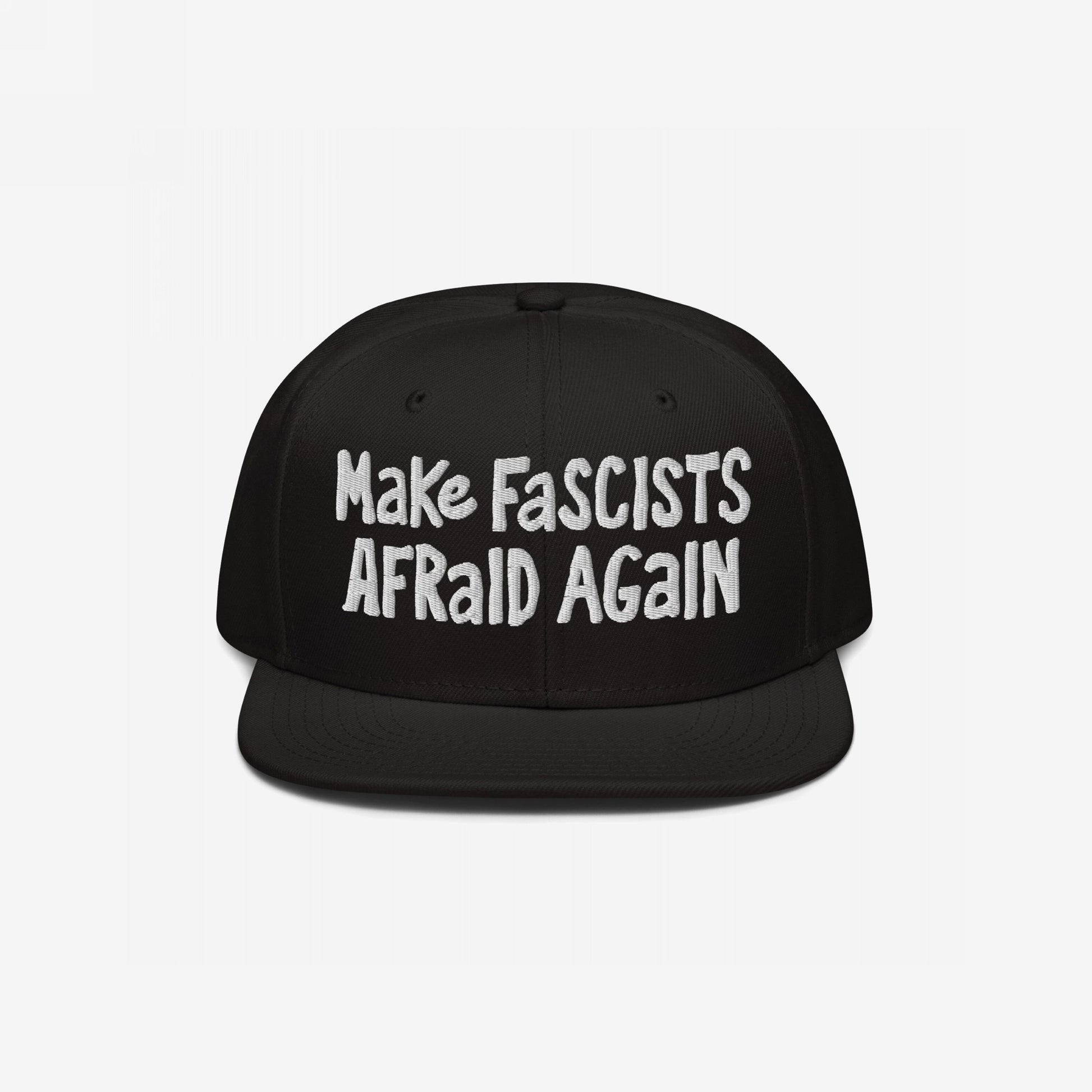 Black snap-back baseball cap with white embroidered text “Make Fascists Afraid Again,” capturing a bold stance against fascism. The cap embodies unapologetic resistance with its raw, hand-drawn lettering style.