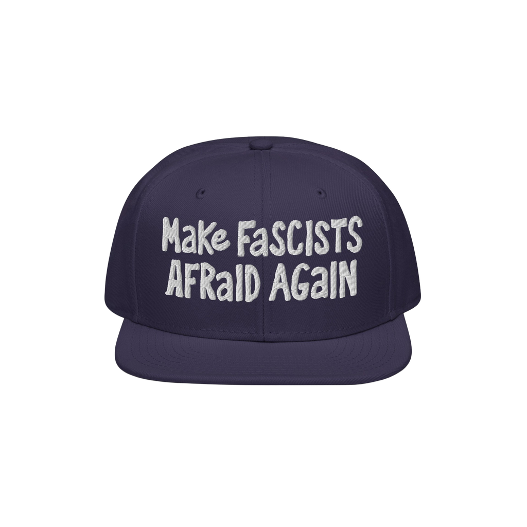 Dark-blue flat-brim cap with white embroidery reading “Make Fascists Afraid Again.” Features raw, hand-drawn style for ev