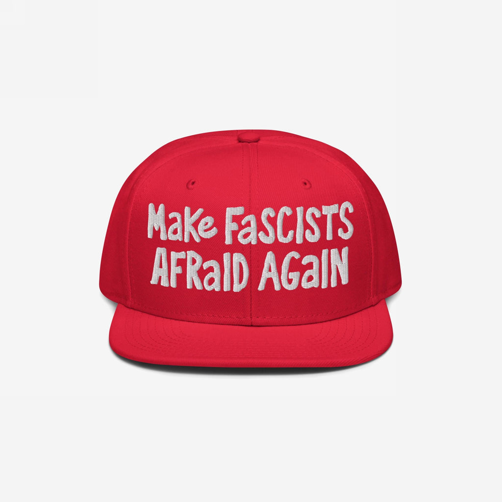 Red flat-brim cap with “Make Fascists Afraid Again” in white embroidery; embodies a bold, rebellious statement against fascism, ideal for protests or casual wear, supporting ACLU with each purchase.